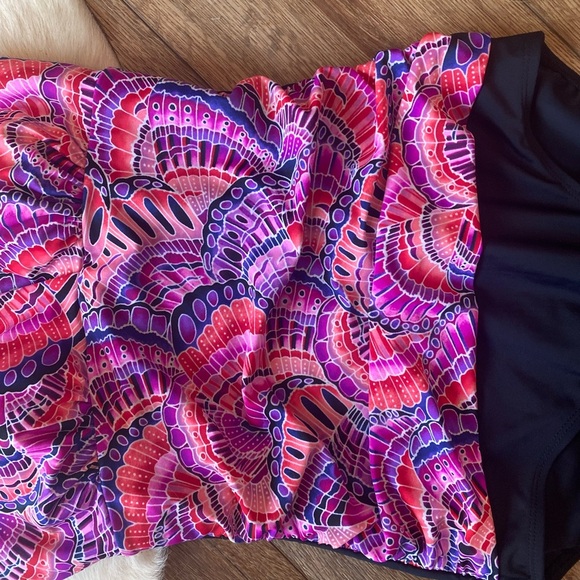 Krista brand one-piece swimsuit with a colorful, patterned top and black bottom - Picture 6 of 8